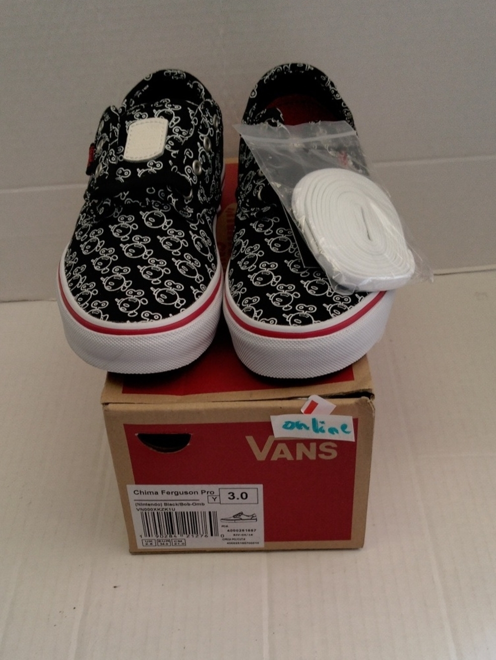 Vans Kids Black Patterned Nintendo Slip-On Sneakers with White Soles